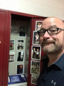 School Suicide: Jeff Yalden helps the students move forward while together they cleared the locker.